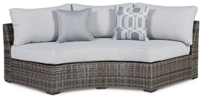 Ashley Gray Harbor Court Curved Loveseat with Cushion