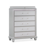 Gray dresser with five drawers on a white background