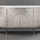Decorative sideboard with wavy pattern on a gray background
