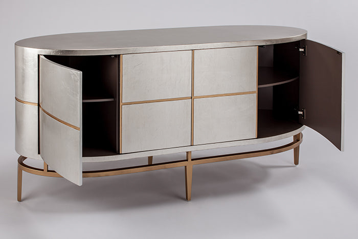 Modern metallic sideboard with open doors on a white background