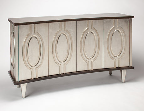 Decorative console table with mirror-like surface and oval designs on a white background