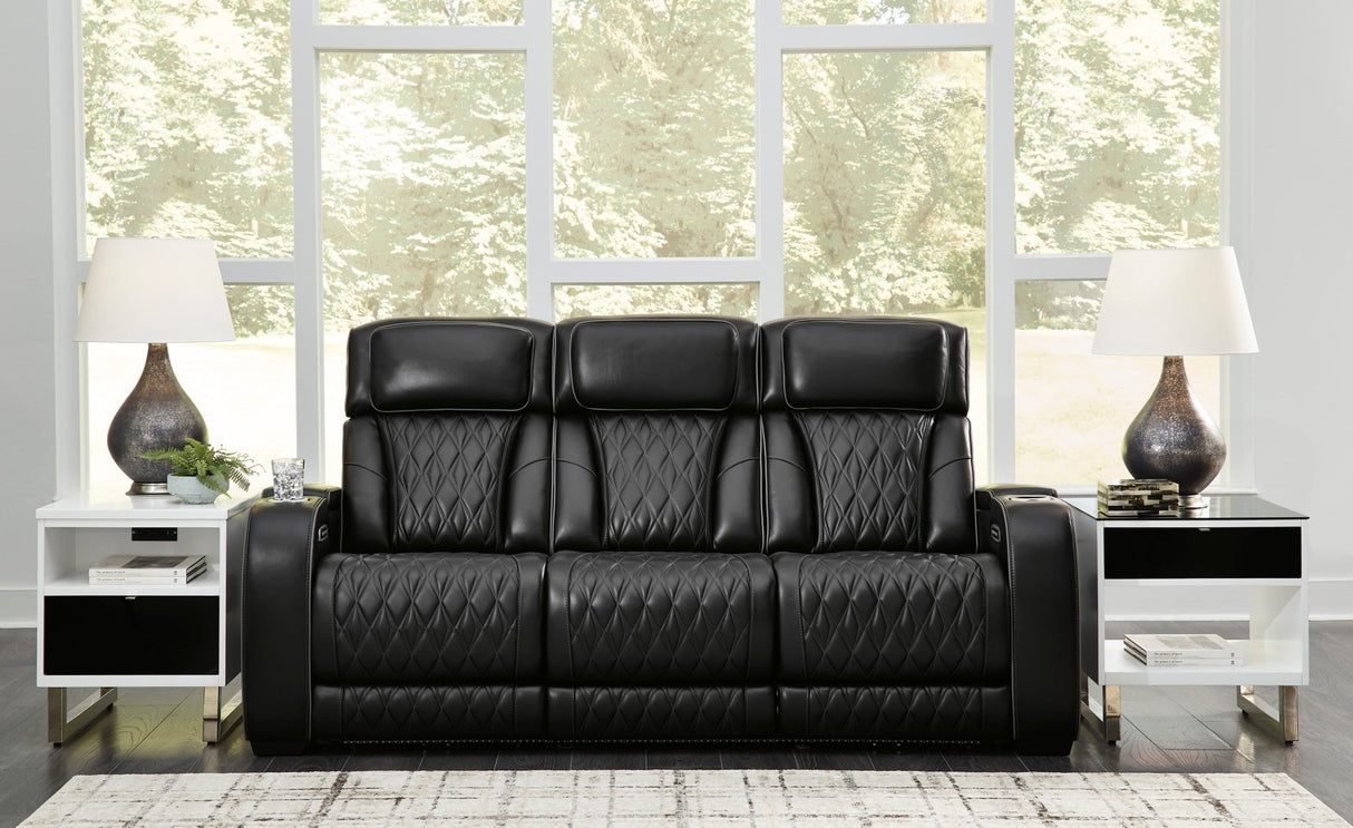 Boyington Power Reclining Sofa with Adjustable Headrests in Black Leather by Ashley | Home Elegance USA