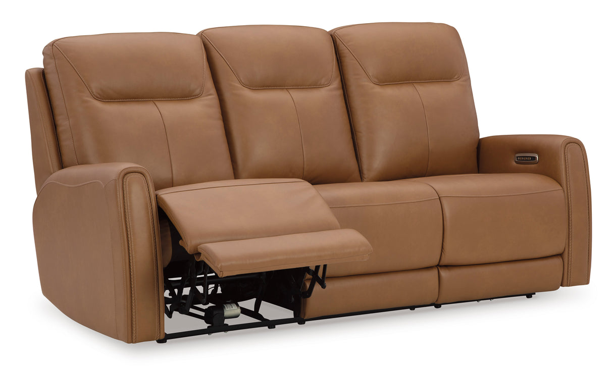 Tryanny Power Reclining Sofa with Adjustable Headrests in Butterscotch Leather by Ashley