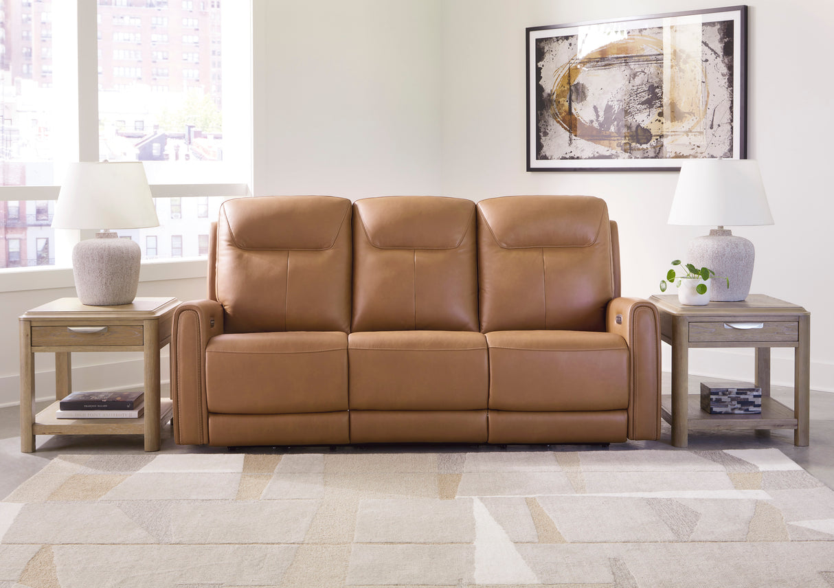 Tryanny Power Reclining Sofa with Adjustable Headrests in Butterscotch Leather by Ashley