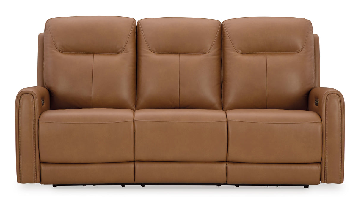 Tryanny Power Reclining Sofa with Adjustable Headrests in Butterscotch Leather by Ashley