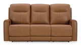 Tryanny Power Reclining Sofa with Adjustable Headrests in Butterscotch Leather by Ashley