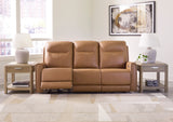 Tryanny Power Reclining Sofa with Adjustable Headrests in Butterscotch Leather by Ashley - Home Elegance USA