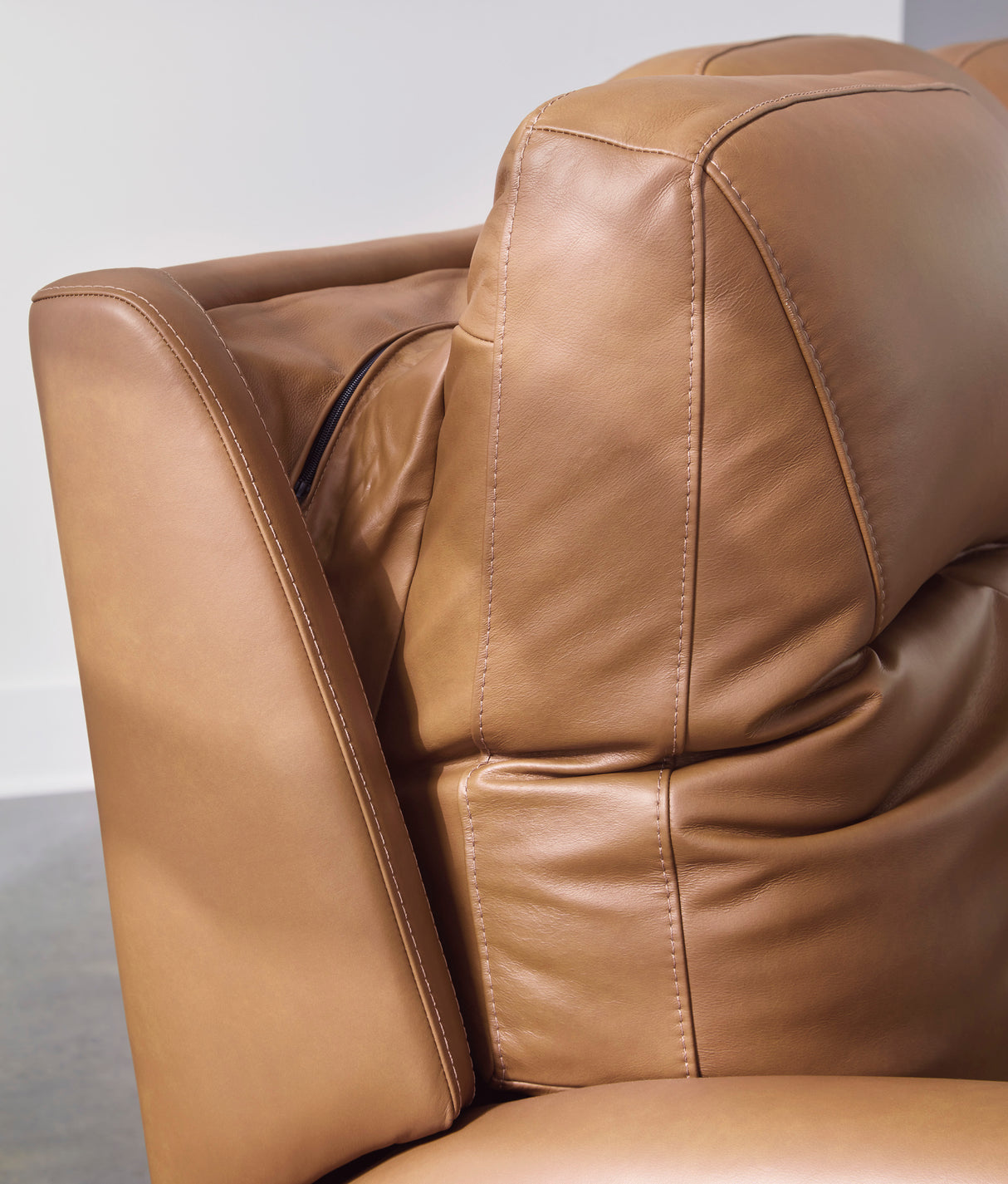 Tryanny Power Reclining Sofa with Adjustable Headrests in Butterscotch Leather by Ashley