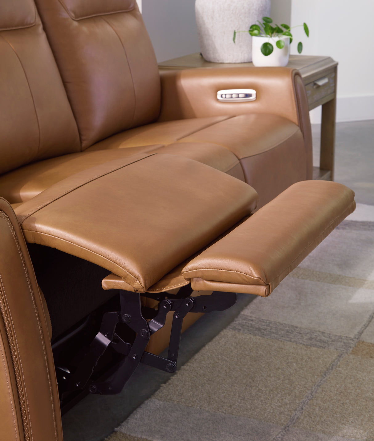 Tryanny Power Reclining Sofa with Adjustable Headrests in Butterscotch Leather by Ashley - Home Elegance USA