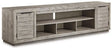 Ashley Gray Naydell XL TV Stand w/Fireplace Option | Home Elegance USA