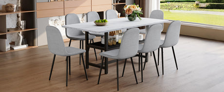 Table and chair set.71*35.4 inch White Grain Spliced Dining Table With Storage Function In The Middle Of The Table Legs.Paired with 8 Light Gray Linen-Cotton Material High Resilience Dining Chairs. - sold by Home Elegance USA