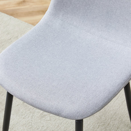 Table and chair set.71*35.4 inch White Grain Spliced Dining Table With Storage Function In The Middle Of The Table Legs.Paired with 8 Light Gray Linen-Cotton Material High Resilience Dining Chairs. - sold by Home Elegance USA