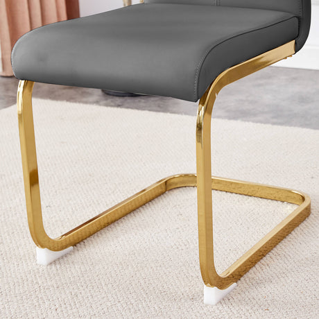 Table and chair set.Elegant Transparent Tempered Glass Dining Set - 71'x35.4' with 8 Dark Gray PU Chairs with golden C-tube metal leg. - sold by Home Elegance USA