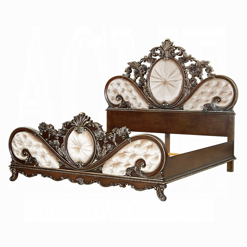 Decorative headboard with intricate carvings and white upholstered sections on a white background