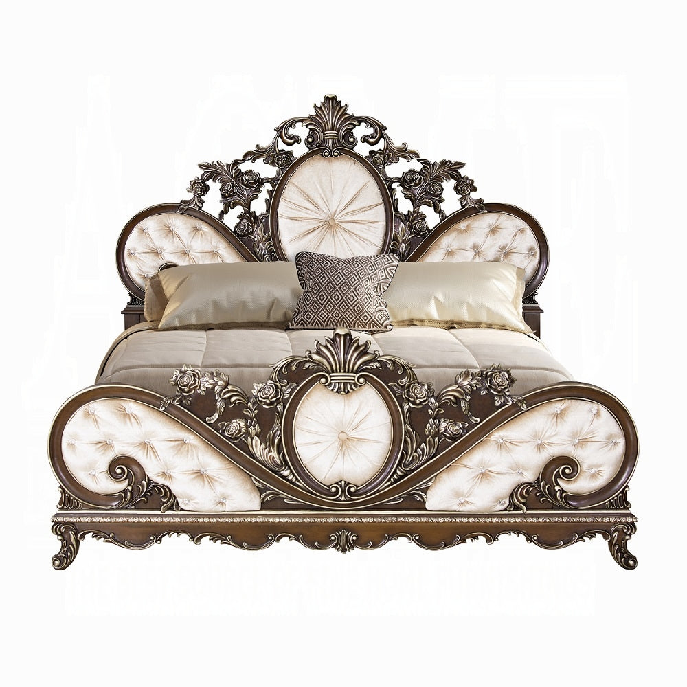 Decorative bed with intricate headboard design on a white background