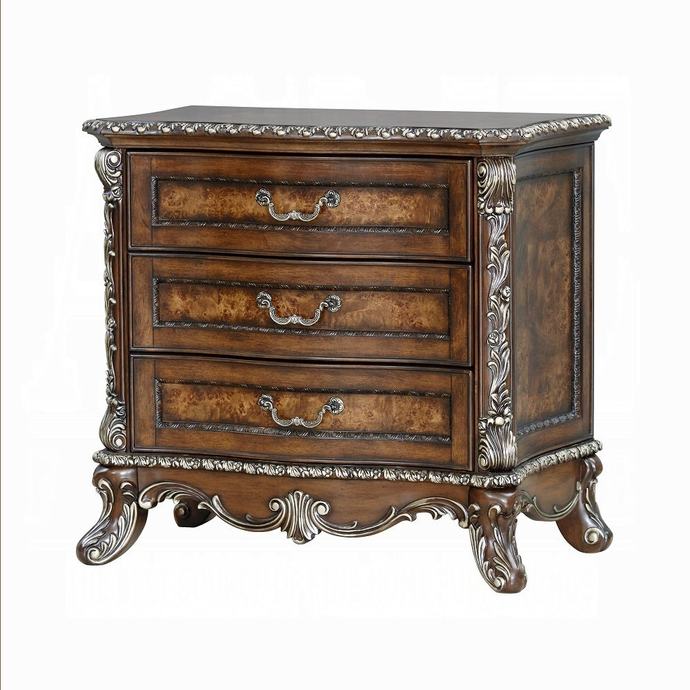Decorative wooden dresser with silver accents on a white background