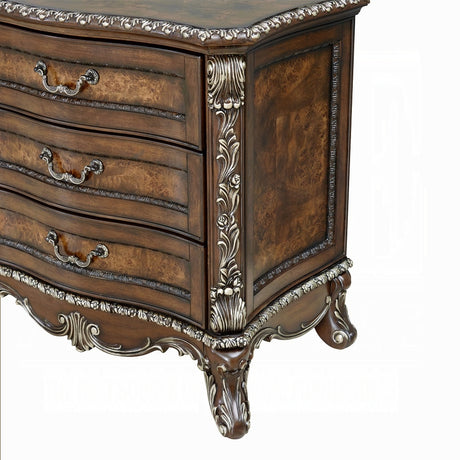 Decorative wooden chest with intricate carvings on a white background