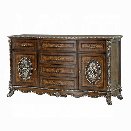 Decorative wooden sideboard with intricate carvings on a white background