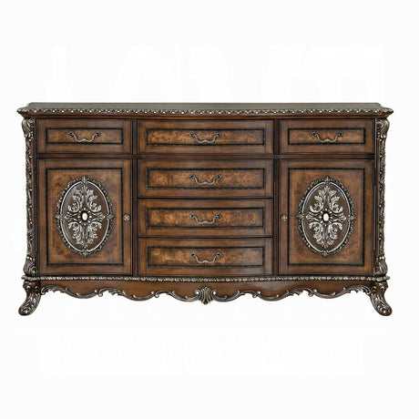 Decorative wooden sideboard with intricate carvings on a white background