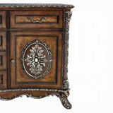 Decorative wooden cabinet with intricate carvings on a white background