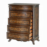 Wooden dresser with decorative carvings on a white background