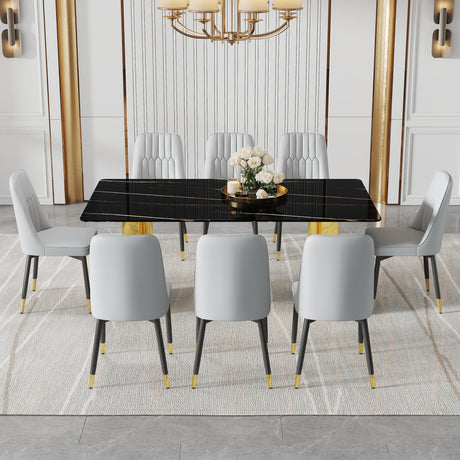 Table and chair set.The table has a glass top with imitation marble pattern stickers and stainless steel golden legs.Paried with 8 Light Gray chairs with PU cushions and black legs.W1151S01546 - sold by Home Elegance USA