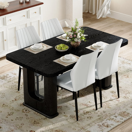 Table and chair set.64.5 x 35.4 Inch Stylish Black Wood Color Textured Dining Table.Paired with 4 Black - and - White PU Dining Chairs with Shell - pattern. Exudes A Strong Sense Of Fashion. - sold by Home Elegance USA