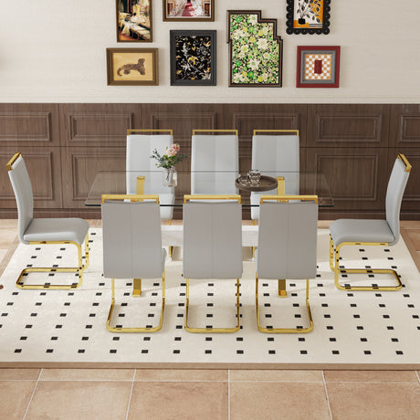 Table and chair set.Elegant Transparent Tempered Glass Dining Set - 71'x35.4' with 8 Light Gray PU Chairs with golden C-tube metal leg. - sold by Home Elegance USA