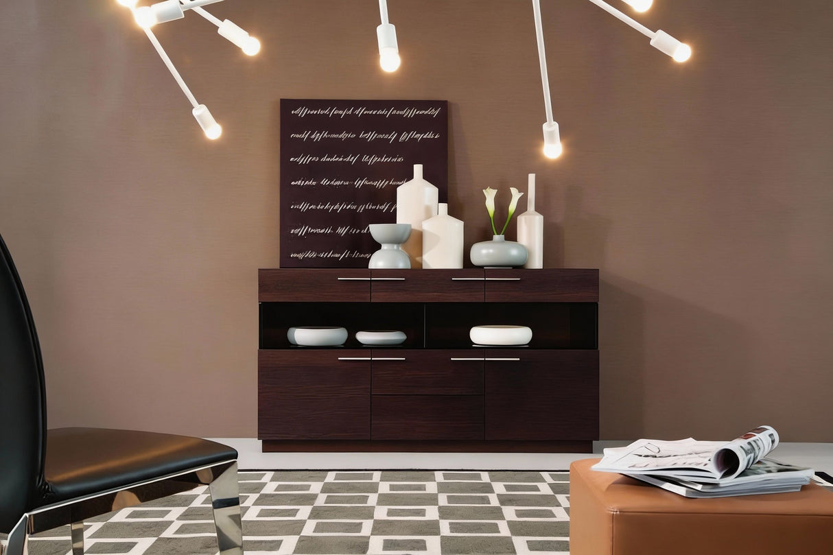 Modern interior with a dark wooden dresser, decorative items, and a chair.