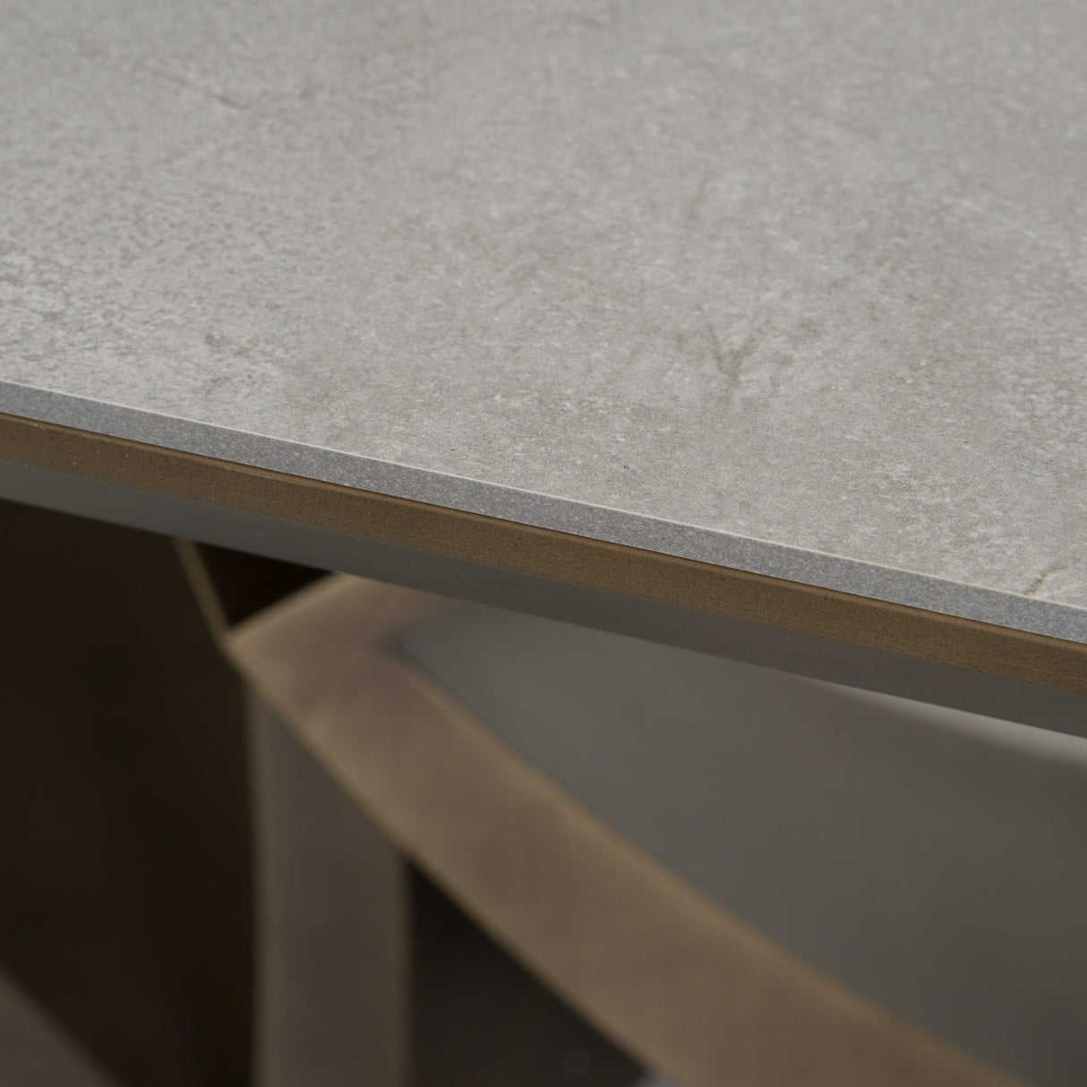 Dollemore - Modern Faux Travertine Ceramic + Antique Brass Dining Table - View Image 1