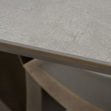 Dollemore - Modern Faux Travertine Ceramic + Antique Brass Dining Table - View Image 1