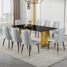 Table and chair set.The table has a glass top with imitation marble pattern stickers and stainless steel golden legs.Paried with 8 Light Gray chairs with PU cushions and black legs.W1151S01546 - sold by Home Elegance USA