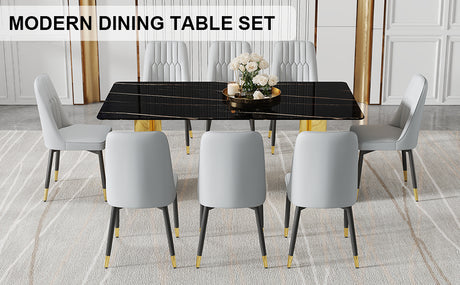 Table and chair set.The table has a glass top with imitation marble pattern stickers and stainless steel golden legs.Paried with 8 Light Gray chairs with PU cushions and black legs.W1151S01546 - sold by Home Elegance USA