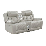 Side angle of Huron power reclining loveseat in gray faux leather with USB charging ports and plush cushions