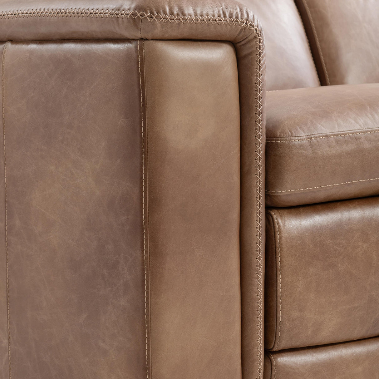 close-up view of the Lioni Leather Power Motion Sofa by Bernhardt in Brown Leather, with power footrests and adjustable headrests