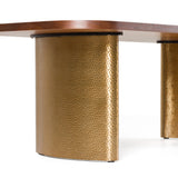 Round table with wooden top and textured gold base on a white background