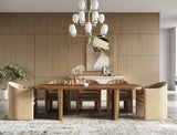 Marjorie Dining room with wooden table and chairs, chandelier, and decorative elements.