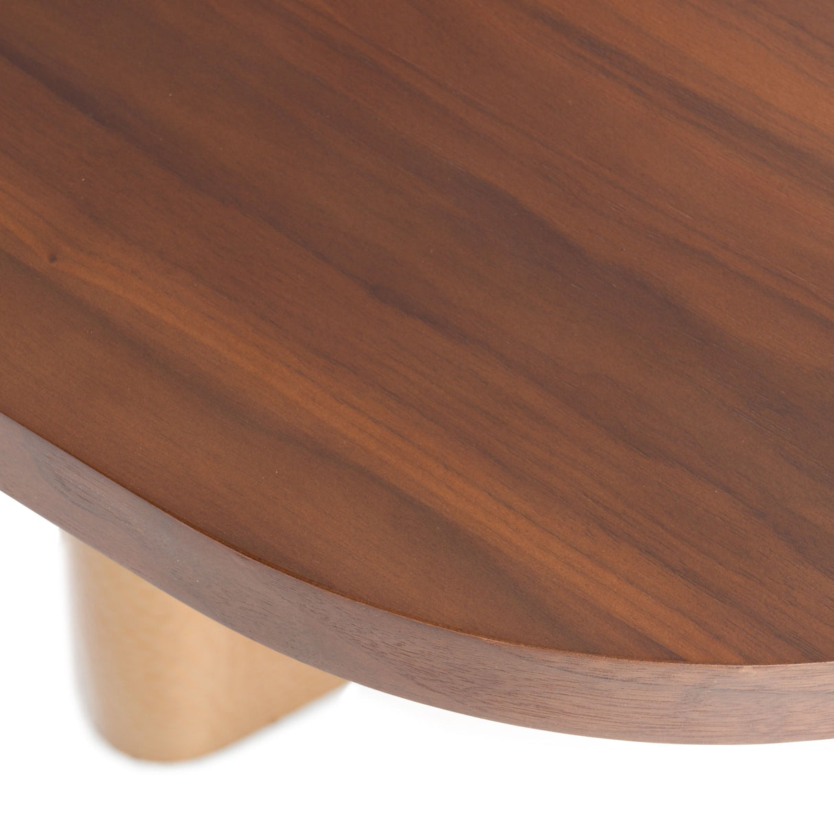 Close-up of a wooden table with a white background