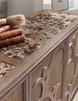 Silver leaf dancer motif and frame detail on door fronts