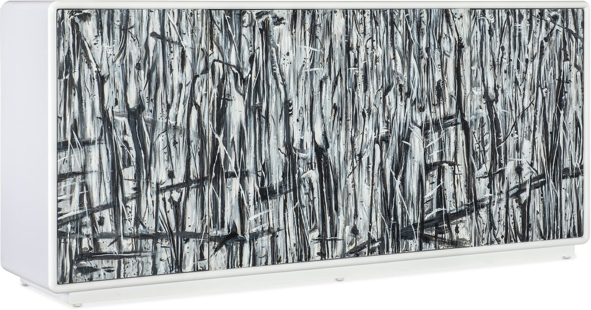 Angle view of the Hooker Furniture Mélange Graffitio Credenza with hand-painted abstract doors in white, gray, and black.