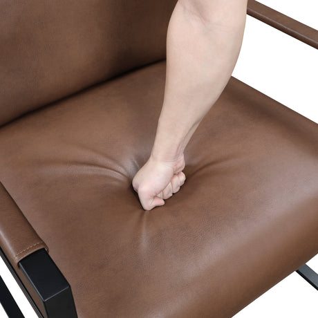 Cushion detail of the Trent accent chair in brown faux leather
