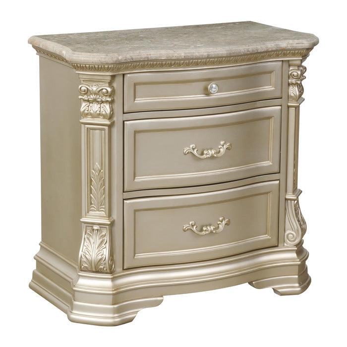 Antoinetta 1919NC-4 Marble-Top Nightstand in champagne finish with 3 storage drawers and ornate European carvings. 34.75”W x 18”D x 32”H. Includes free white-glove shipping and assembly.
