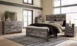 Wynnlow - Gray - 6 Pc. - Dresser, Mirror, Chest, King Crossbuck Panel Bed | Ashley