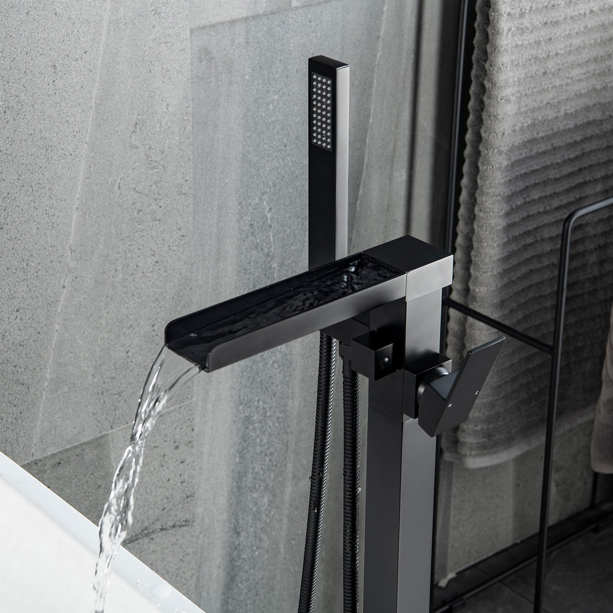 Single-Handle Freestanding Floor Mount Roman Tub Faucet Bathtub Filler with Hand Shower in Matte Black