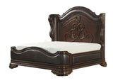 Royal Highlands Eastern King bed in dark cherry with brown faux leather upholstered panels and nailhead trim. Traditional carved design. Dimensions 87W × 90.5D × 75H.
